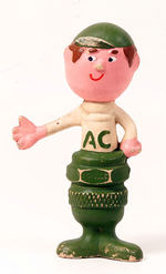 "AC" SPARK PLUG RUBBER FIGURE.