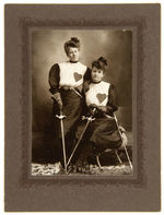 VINTAGE FEMALE ATHLETE PHOTO PAIR.