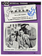 “THEME FROM THE MAN FROM U. N. C. L. E.” SHEET MUSIC SIGNED BY ROBERT VAUGHN AND DAVID McCALLUM.