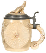 ELABORATE “L.A.W.” STYLIZED HIGH WHEEL BICYCLE MUG WITH LITHOPANE BOTTOM.