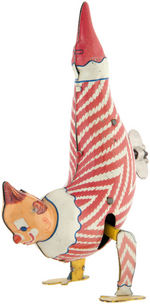 "CLARABELL STANDING ON HANDS" LINEMAR WIND-UP TOY.