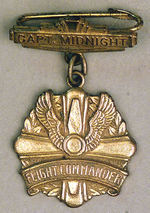 "CAPTAIN MIDNIGHT FLIGHT COMMANDER" FLYING CROSS BADGE.