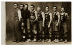 "EASTMAN 1913" BASKETBALL TEAM REAL PHOTO POSTCARD.