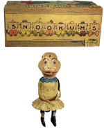 SNOOKUMS GERMAN WINDUP TOY W/CUSTOMIZED BOX.