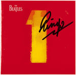 RINGO STARR SIGNED "THE BEATLES - 1" CD BOOKLET.