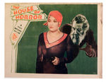 "THE HOUSE OF HORROR" LOBBY CARD.