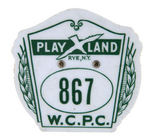 "PLAY LAND RYE, N.Y." PAIR OF SERIAL NUMBERED PLASTIC BADGES.