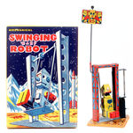 "SWINGING BABY ROBOT" BOXED WINDUP.