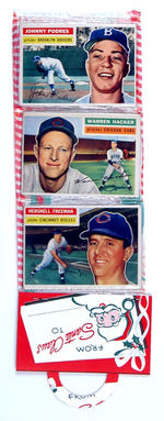 CHRISTMAS RACK PACK WITH TWELVE TOPPS 1956 BASEBALL CARDS.