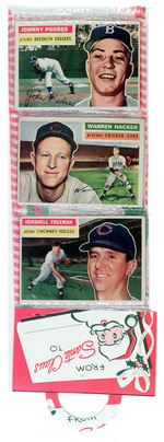 CHRISTMAS RACK PACK W/12 TOPPS 1956 CARDS.