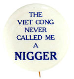 MUHAMMAD ALI RELATED 1960's BUTTON WITH PARAPHRASE OF HIS ANTI-VIETNAM WAR QUOTATION.