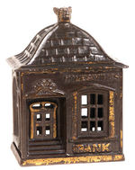 CAST IRON "HOME SAVINGS BANK" W/DOG FINIAL.