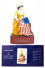 "BETSY ROSS" LIMITED EDITION MECHANICAL BANK W/PROMOTIONAL FOLDER.