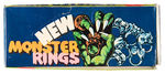 "NEW MONSTER RINGS" DISPLAY BOX WITH RINGS.