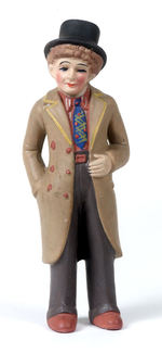 "HARPO MARX" BISQUE FIGURE.