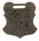 TAFT SILVERED BRASS WATCH FOB.