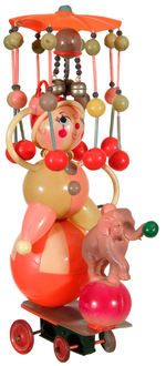 ELABORATE CELLULOID TOY FEATURING CLOWN AND ELEPHANT.
