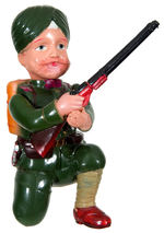 LARGE AND IMPRESSIVE HINDU SOLDIER WITH RIFLE CELLULOID WIND-UP.