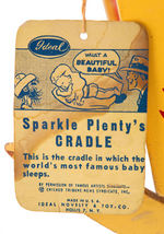 DICK TRACY CHARACTER "SPARKLE PLENTY'S CRADLE" WITH STRING TAG.