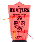 THE BEATLES “MASTRO FOUR POP GUITAR”/GUITAR STRING IN STORE PACKAGE.