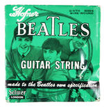 THE BEATLES “MASTRO FOUR POP GUITAR”/GUITAR STRING IN STORE PACKAGE.