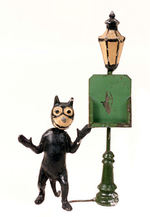 FELIX THE CAT METAL NODDER BY LAMP POST.