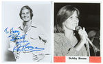 “TO HARRY WITH WARMEST WISHES PAT BOONE”/DEBBIE BOONE AUTOGRAPHED PHOTO PAIR.