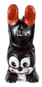 "FELIX" THE CAT PAINTED AND GLAZED CHINA FIGURINE.