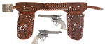 ROY ROGERS ELABORATE HOLSTER SET WITH LARGE BUCKLE AND CAP GUNS.