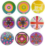 “PETER MAX” GROUP OF NINE LATE 1960s BUTTONS FEATURING HIS DISTINCTIVE DESIGNS.