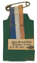 UNION ISSUED “OUR SHIRT FOR ROOSEVELT” 1940 FIGURAL BADGE.