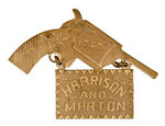 "HARRISON AND MORTON 1888" DIE-CUT REVOLVER BRASS PIN.