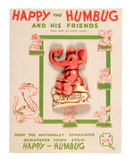 "WONDROUS PINK ELEPHANT" PLASTIC PIN ON "HAPPY THE HUMBUG" CARD.