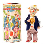 "SMILING SAM THE CARNIVAL MAN" BOXED WIND-UP.