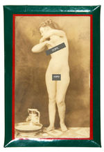 CELLULOID-COVERED PLAQUES FEATURING PHOTOS OF NUDE FEMALE MODELS.