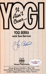 YOGI BERRA AND WHITEY FORD SIGNED BOOK PAIR.