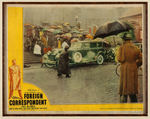 ALFRED HITCHCOCK'S "FOREIGN CORRESPONDENT" FRAMED LOBBY CARD DISPLAY.