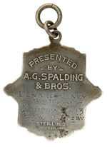 "SPALDING CHAMPION BASEBALL MEDAL" IN "STERLING" WITH EXTENSIVE ENGRAVED REVERSE.