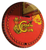 MARX WIND-UP SPARKING “G-MAN GUN.”