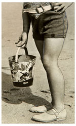 VINTAGE NEWS SERVICE PHOTO FEATURING MICKEY MOUSE SAND PAIL.