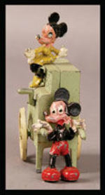 MICKEY AND MINNIE MOUSE WITH STREET ORGAN METAL FIGURE SET.