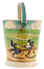 EXTREMELY RARE DISNEY CHARACTER EMBOSSED TIN SAND PAIL.