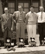 EARLY DISNEY STUDIO STAFF PHOTO & INAUGURAL DISNEY LEGENDS PROGRAM WITH THE NINE OLD MEN.