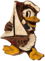 DONALD DUCK WITH HIS SAILBOAT RARE C. 1938 PAINTED WOOD COMPOSITION PIN.