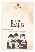 "THE BEATLES" LEATHER & BRASS PIN ON CARD.