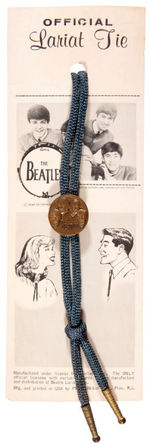 "THE BEATLES OFFICIAL CUFF LINKS/LARIAT TIE" PAIR ON STORE CARDS.