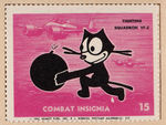 "COMBAT INSIGNIA/WAR INSIGNIA" STAMP ALBUM TRIO FEATURING DISNEY STUDIO DESIGNS.