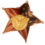 CARTIER JEWELERS WWII FLOWER PETAL-LIKE STAR BADGE WITH MOVING & REFLECTIVE CENTER MOUNT.