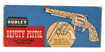 "HUBLEY DEPUTY PISTOL AND BADGE."