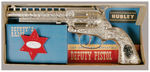 "HUBLEY DEPUTY PISTOL AND BADGE."